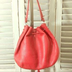 Coral/ red gorgeous over the shoulder bag.